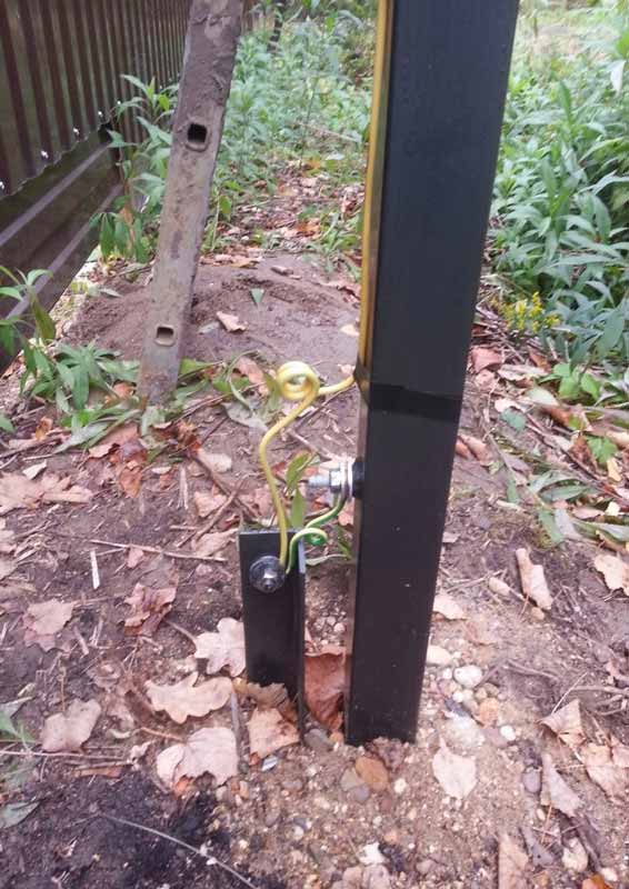 Заземление трубостойки фото